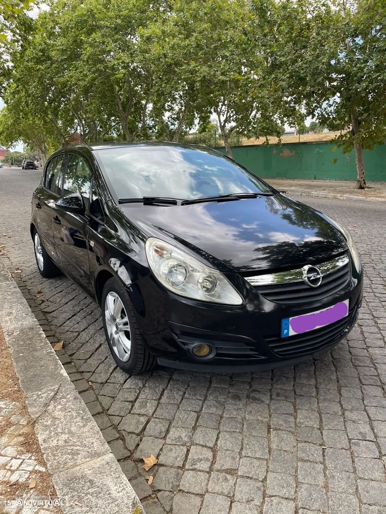 Opel Corsa 1.2 Cosmo - 1