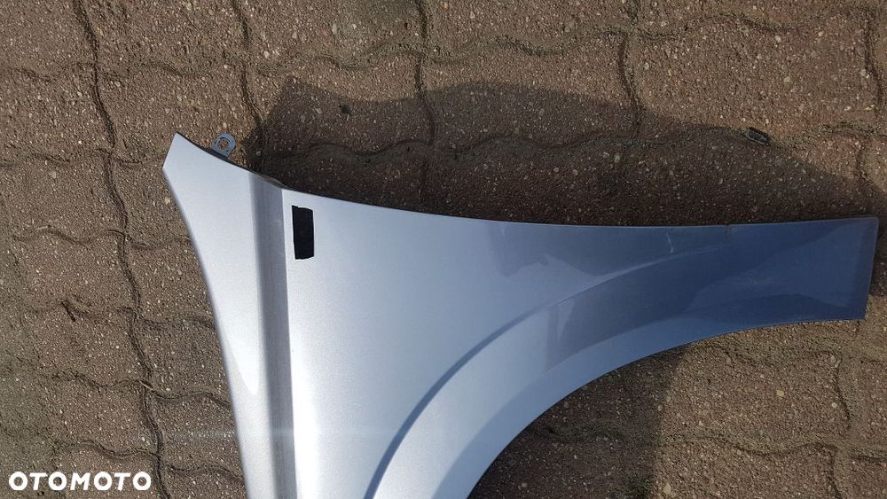 Błotnik przód  lewy  Opel Astra H III kod lakieru Z163 - 4