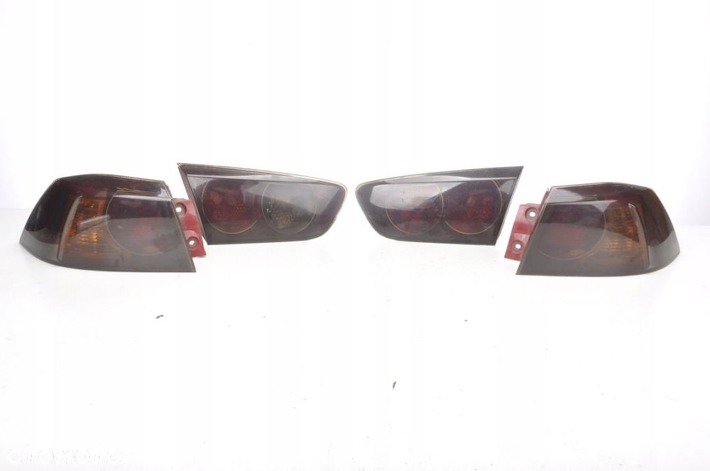 MITSUBISHI LANCER VIII X LAMPY TYŁ KOMPLET - 1
