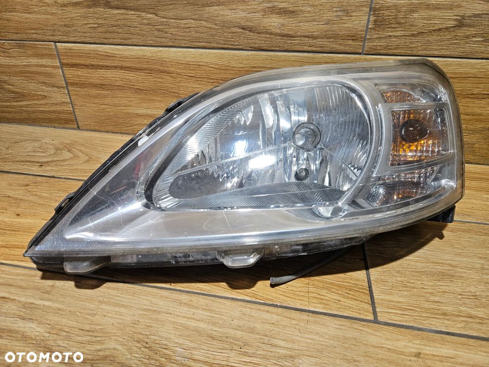 Dacia Logan I LIFT 08-12 Lampa przednia lewa lewy przód 8200744753