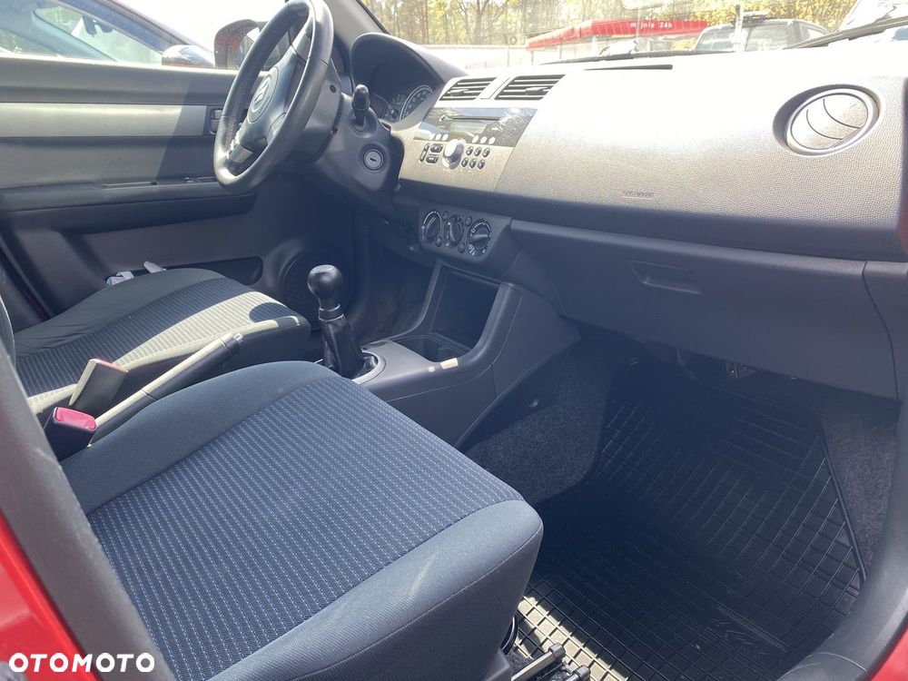 Suzuki Swift 1.3 Club - 8