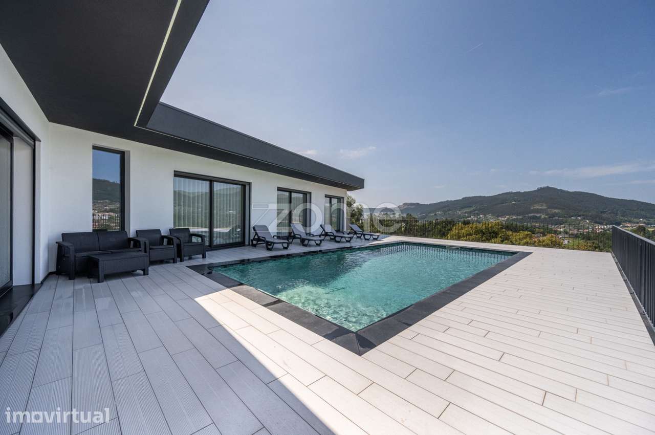 Moradia T3 de luxo com piscina aquecida entre Braga e Guimarães - Grande imagem: 3/56