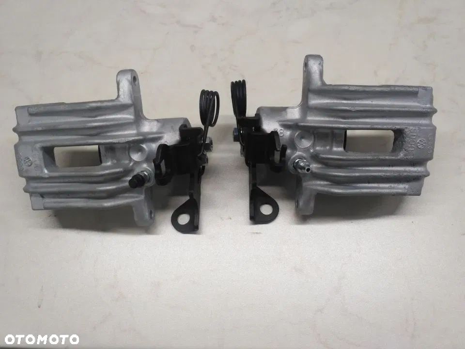 Zacisk passat B5 VW tył Lewy Prawy a4b5 - 2