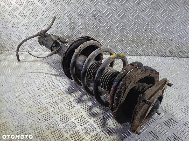 AMORTYZATOR PRAWY PRZEDNI SPRĘŻYNA KIA CARNIVAL - 1