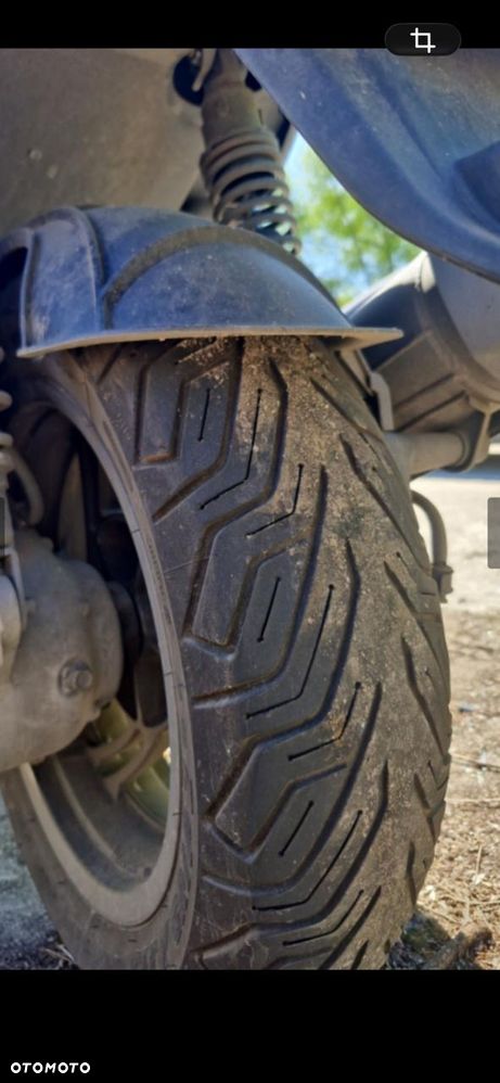 Kymco Xciting - 6
