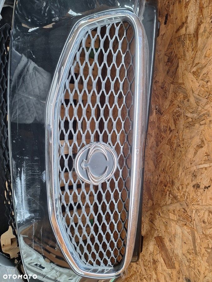 ssangyong korando III 2010- grill atrapa w zderzak orginal - 1