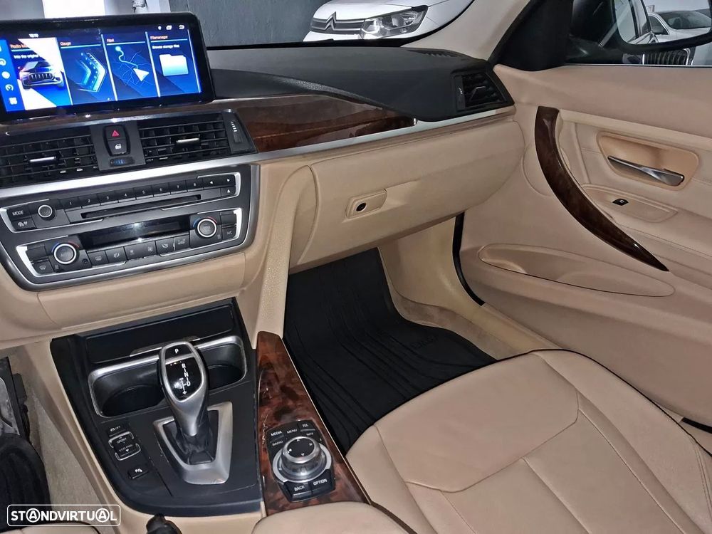 BMW 320 d Auto Exclusive - 12