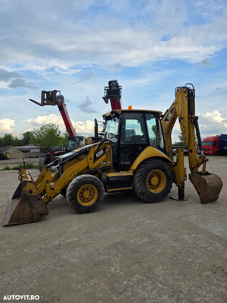 Cat Caterpillar 428F 2014 buldoexcavator buldo compact - 2