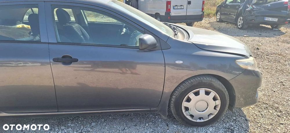 Toyota COROLLA E15 zacisk hamulcowy prawy lewy tył - 9