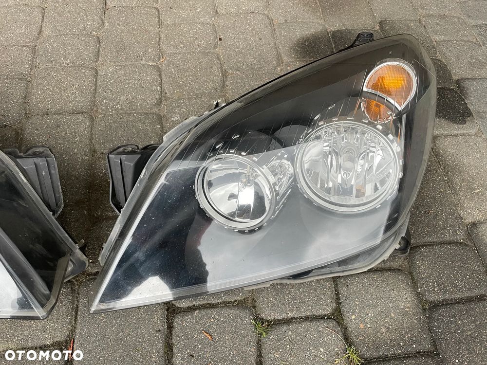 OPEL ASTRA H III LIFT PRZÓD KOMPLETNY ZDERZAK LAMPA REFLEKTOR LEWY przedni GRILL lampa reflektor LEWA PRAWA GTC Hella Z167 - 4