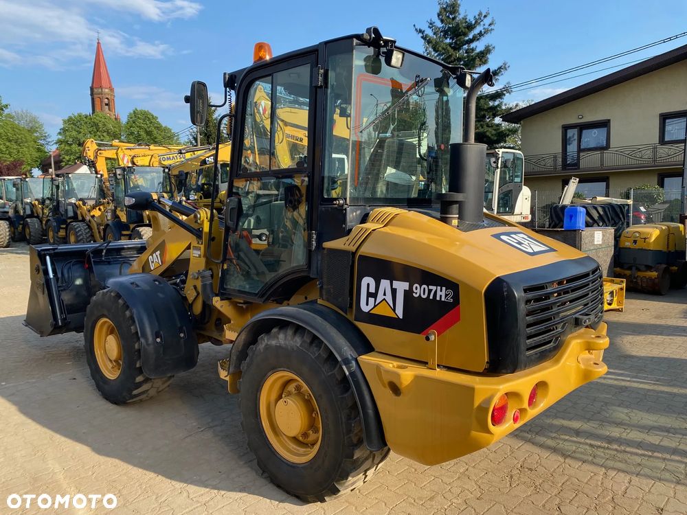 Caterpillar CAT 907H2, 5800 MTH, ŁYŻKA OTWIERANA + WIDŁY, z NIEMIEC, - 4