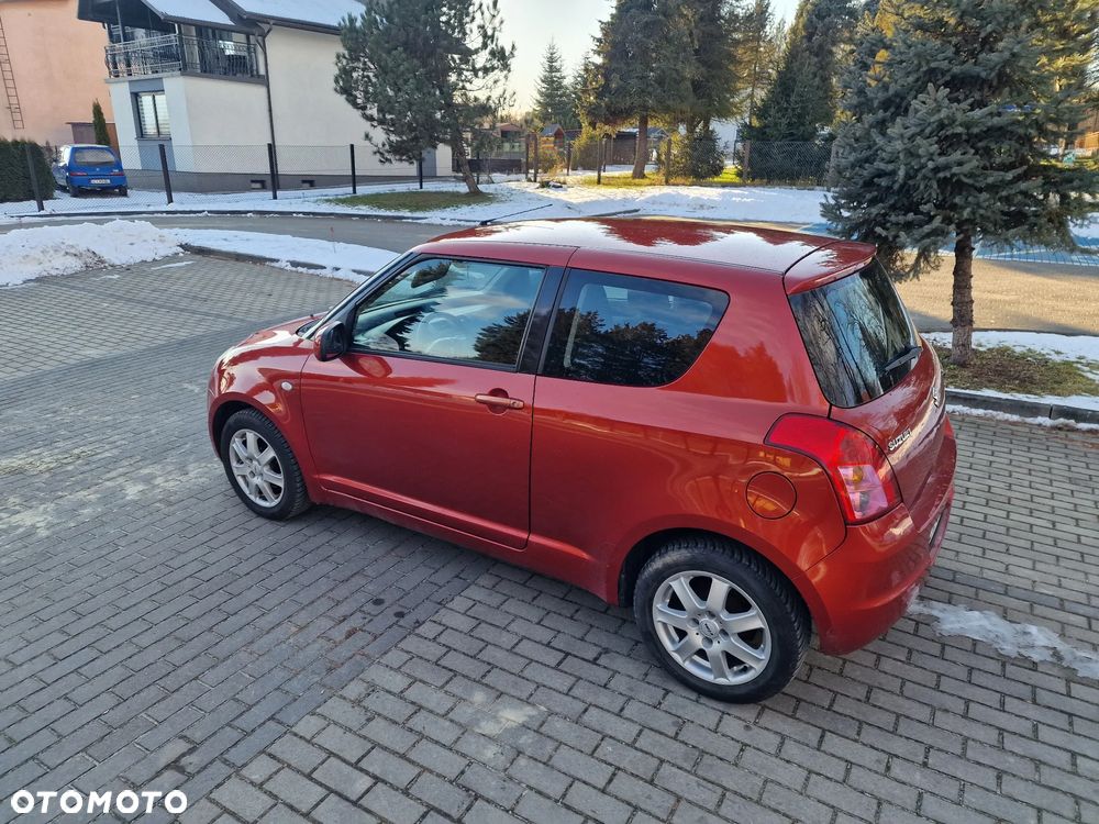 Suzuki Swift 1.3 Club - 8