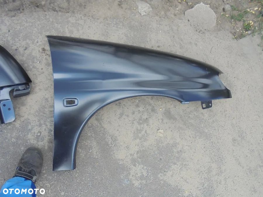 Partner Berlingo 98-02r błotnik przód nowy - 1