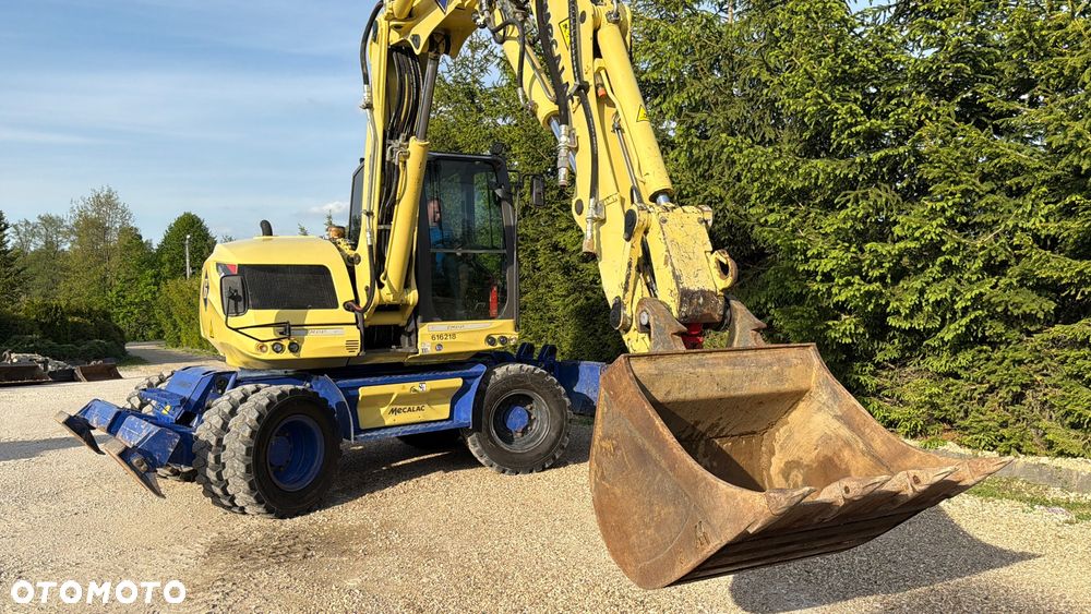 Mecalac Koparka 14 ton MECALAC 15 MWR koparko-ładowarka 3 łyżki widły 1 wł Centr.smarowanie Opony na BLIŹNIAKU 80%Camso ładowarka 714 12MTX 4x4 skrętne KLIMA kabina Premium silnik 146KM volvo EW140B DEUTZ szybka 35km/h - 19