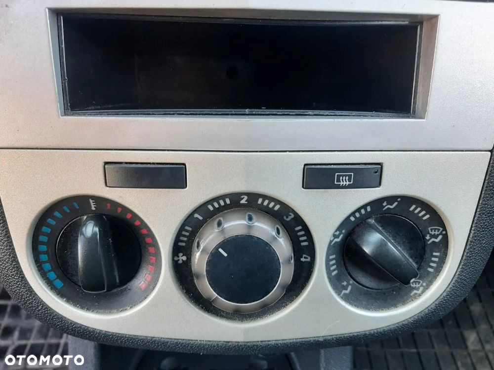 Opel Corsa 1.2 16V Enjoy - 19