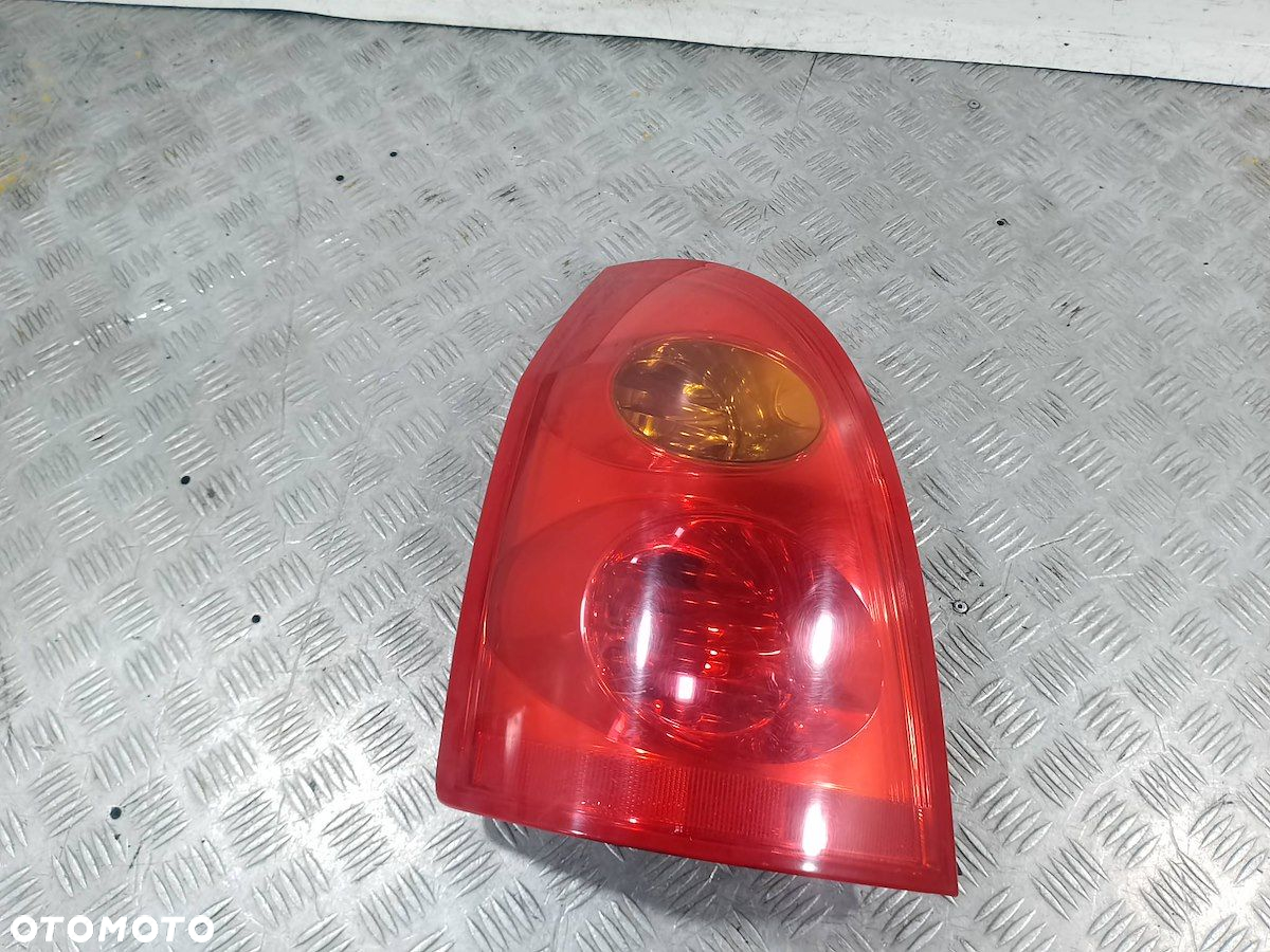 LAMPA TYLNA LEWA NISSAN PRIMERA P12 ( 03-07 ) KOMBI - 7