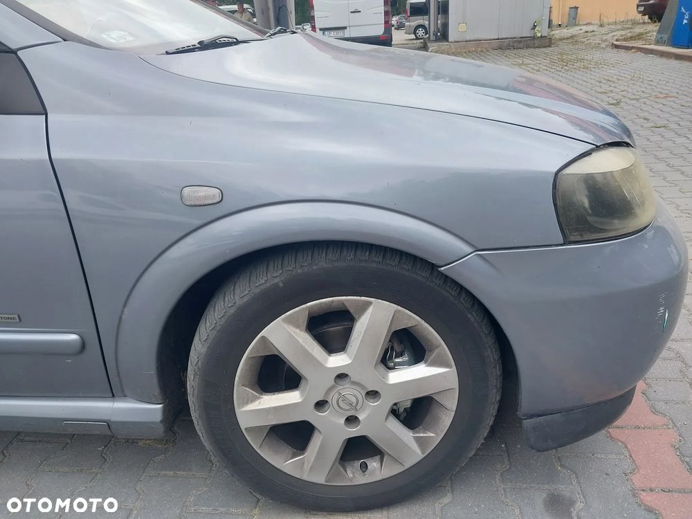 Opel Astra G Bertone Cabrio Cabriolet silnik 1.6 16v 103 KM skrzynia biegów F17 drzwi maska zderzak błotnik lusterko klapa Z4AU Z163 dach dachu składanego maglownica szyba podnośnik fotel kanapa zegary zestaw startowy czujnik felga maglownica zwrotnica sterownik panel moduł listwa wydech tłumik belka sanki zacisk jarzmo tarcza NA CZĘŚCI WSZYSTKIE CZĘŚCI - 18