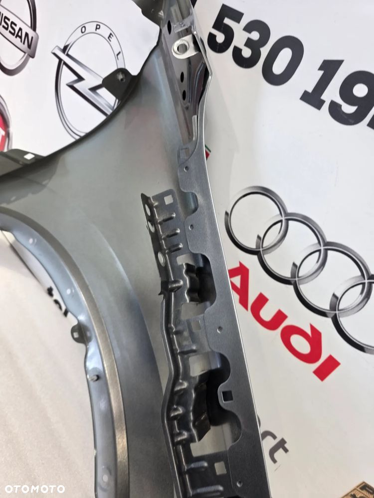 VW TIGUAN III 571 23- LEWY BŁOTNIK PRZEDNI PRZÓD BARDZO  ŁADNY NR 571821105D NR AUKCJI BŁ342 - 28