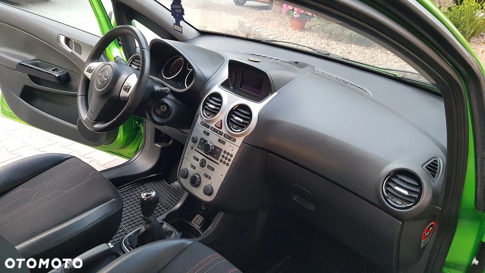 Opel Corsa 1.4 16V Enjoy - 23