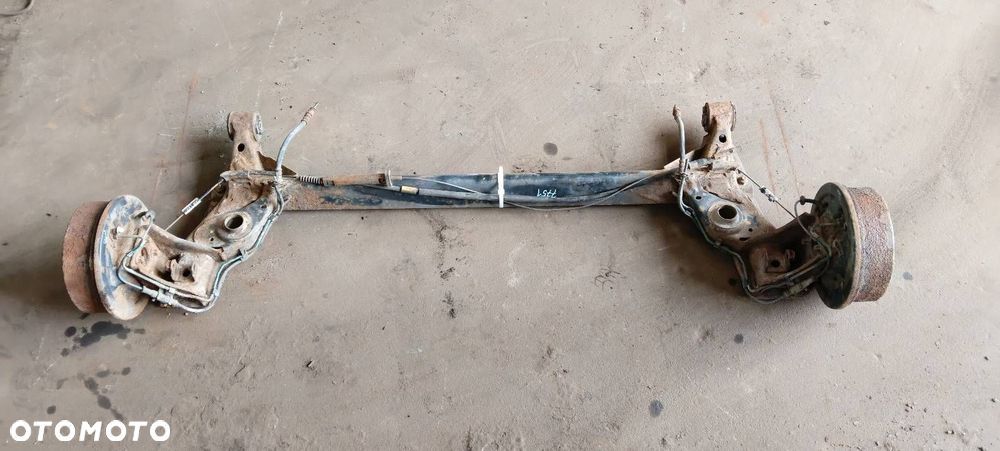 BELKA OŚ ZAWIESZENIA TYŁ BĘBNY Z ABS OPEL CORSA C - 1