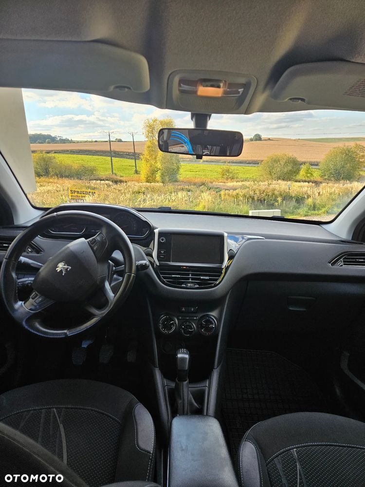 Peugeot 208 2013 photo 4