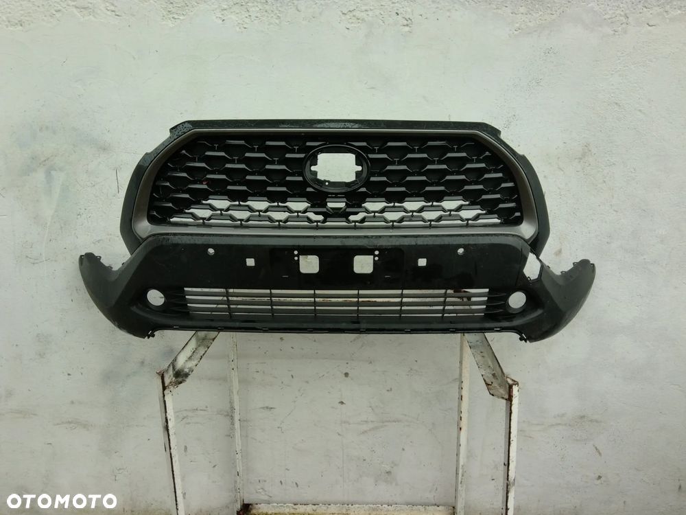 TOYOTA COROLLA CROSS 22-25 52129-16030 ZDERZAK KRATKA ATRAPA ZDERZAKA PRZÓD SPOILER PDC