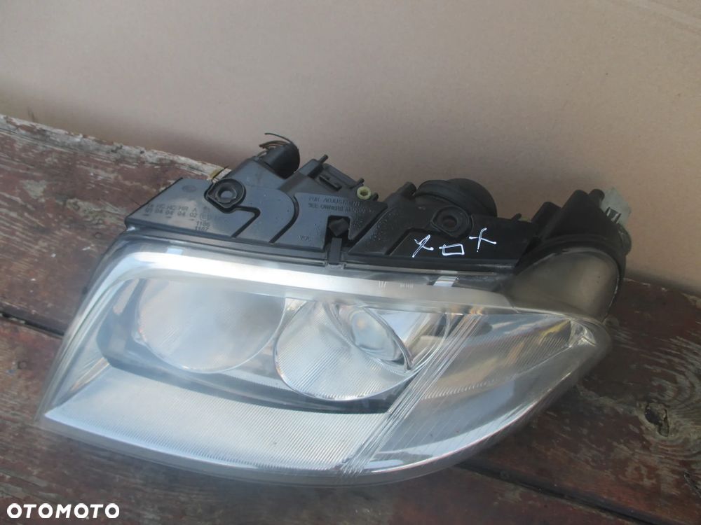 lampa lewa VW Passat B5 lift Hella Europa - 2
