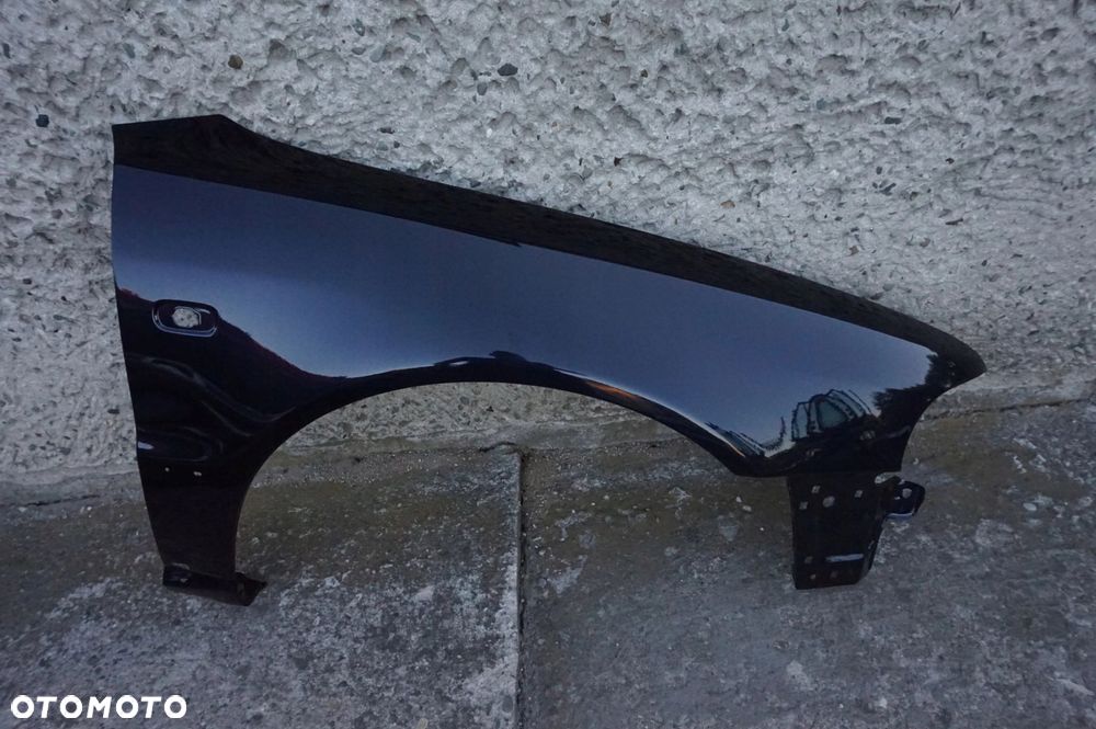 BŁOTNIK PRZEDNI PRAWY AUDI A4 B5 LIFT 99/01r LZ5L