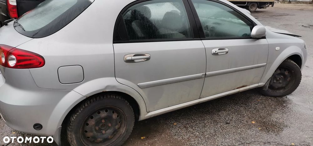 MASKA BLOTNIK ZDERZAK LAMPA DRZWI KLAPA SZYBA CHEVROLET LACETTI U92 - 1