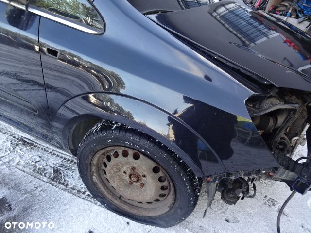 Prawy przedni błotnik Opel Zafira B 2008 Z20R - 1