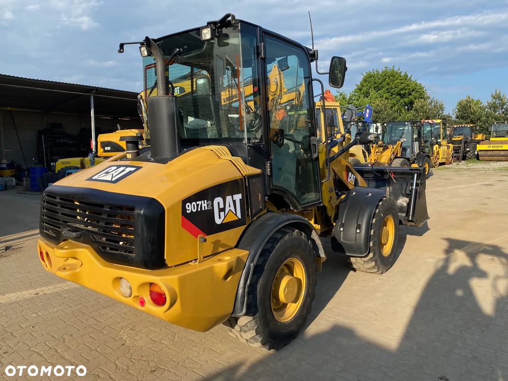 Caterpillar CAT 907H2, 5800 MTH, ŁYŻKA OTWIERANA + WIDŁY, z NIEMIEC, - 7