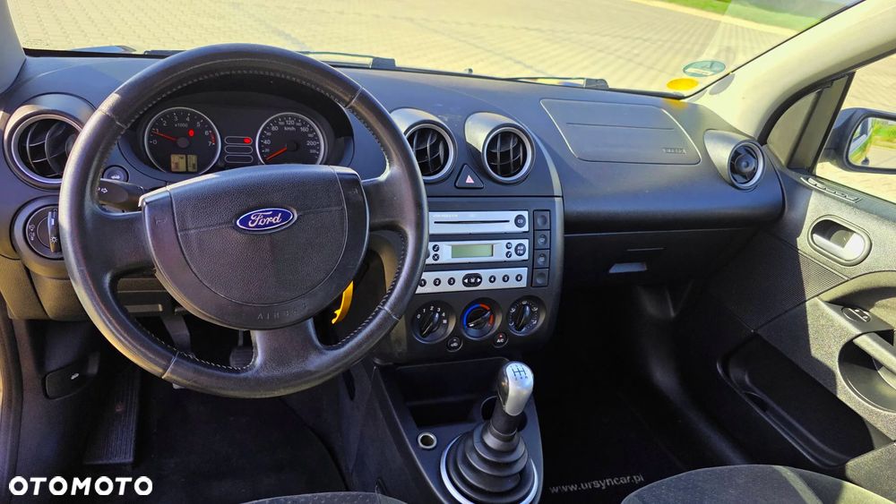 Ford Fiesta 1.4 Ghia - 12
