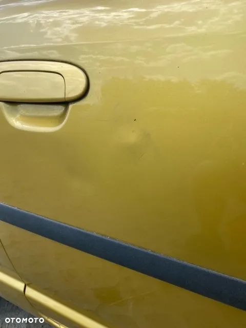 DRZWI LEWE PRAWE TOYOTA YARIS I 580 - 6