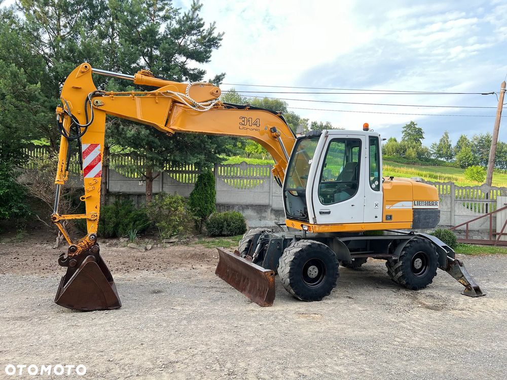 Liebherr A314 LITRONIC Koparka Kołowa 16 Ton 2 Łyżki Pług Podpory