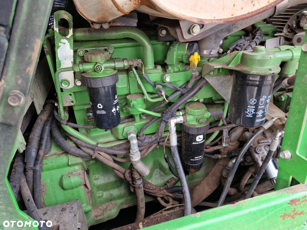 John Deere 1210E - 23