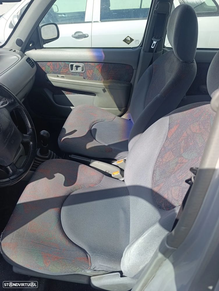 Nissan Micra 1.0 GX - 8