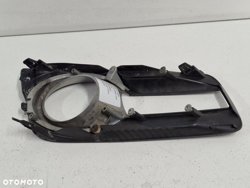 MAZDA CX7 RAMKA OSŁONA HALOGENU LEWA PRZÓD POD KIERUNKOWSKAZ E22150C22 - 9
