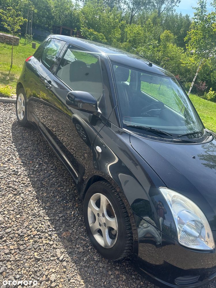 Suzuki Swift 1.3 GLX / Comfort - 13