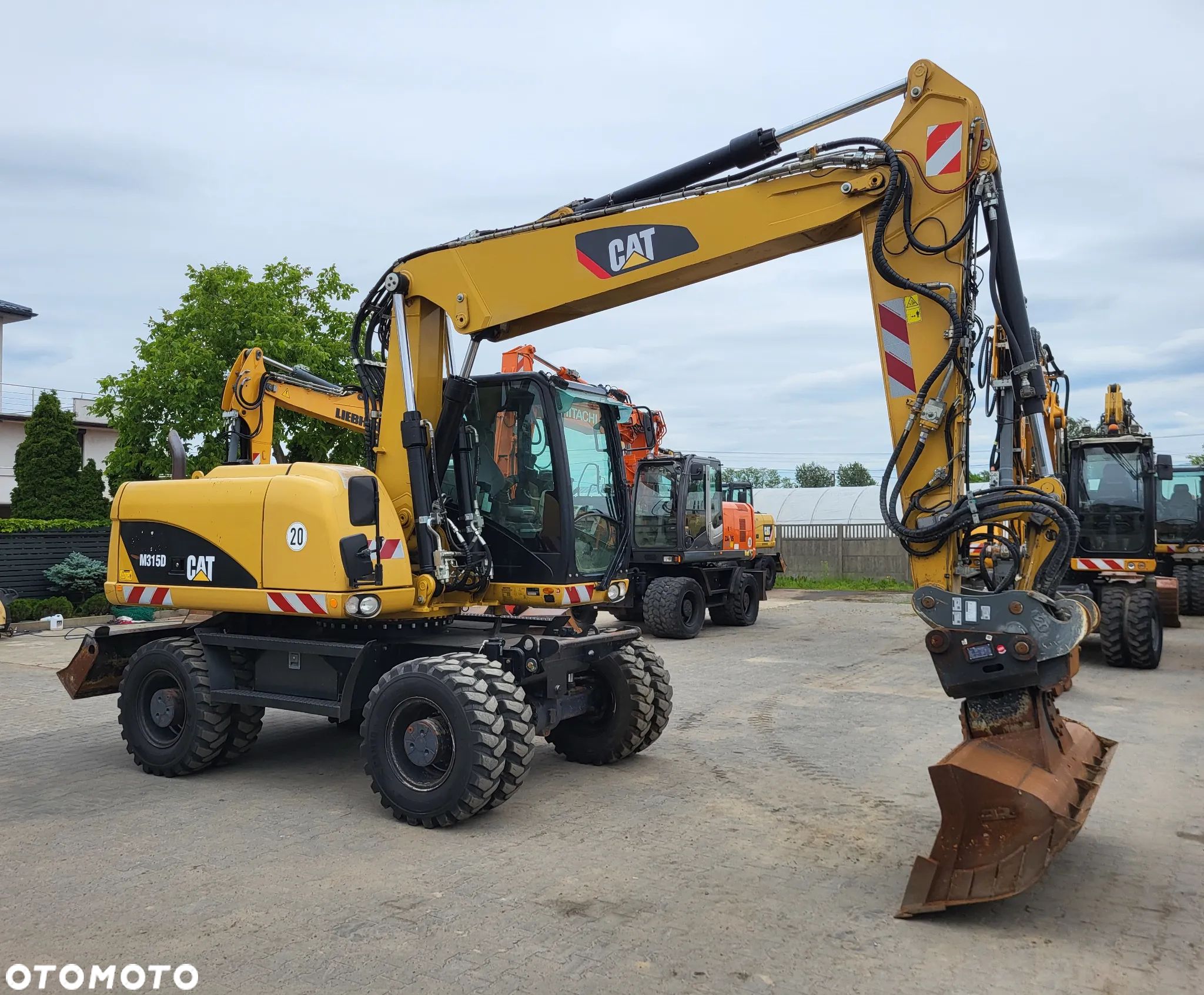 Caterpillar M 315D / z Niemiec / Stan idealny / - 1