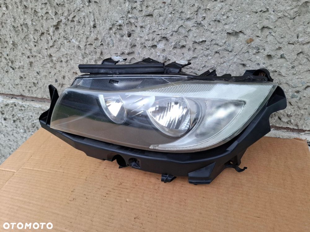 LAMPA PRZEDNIA LEWA BMW E90 E91 05/08r - 6