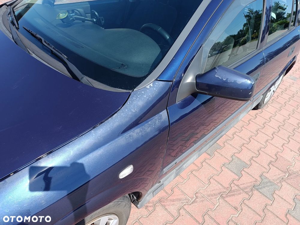 Opel Astra 1.4 Club - 23