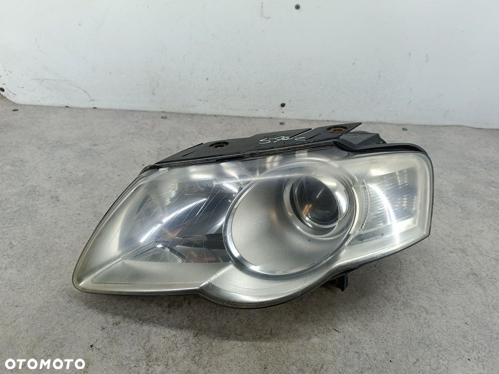 LAMPA PRZÓD LEWA VW PASSAT B6 3C0941005J 1EL247014-01  HELLA - 1