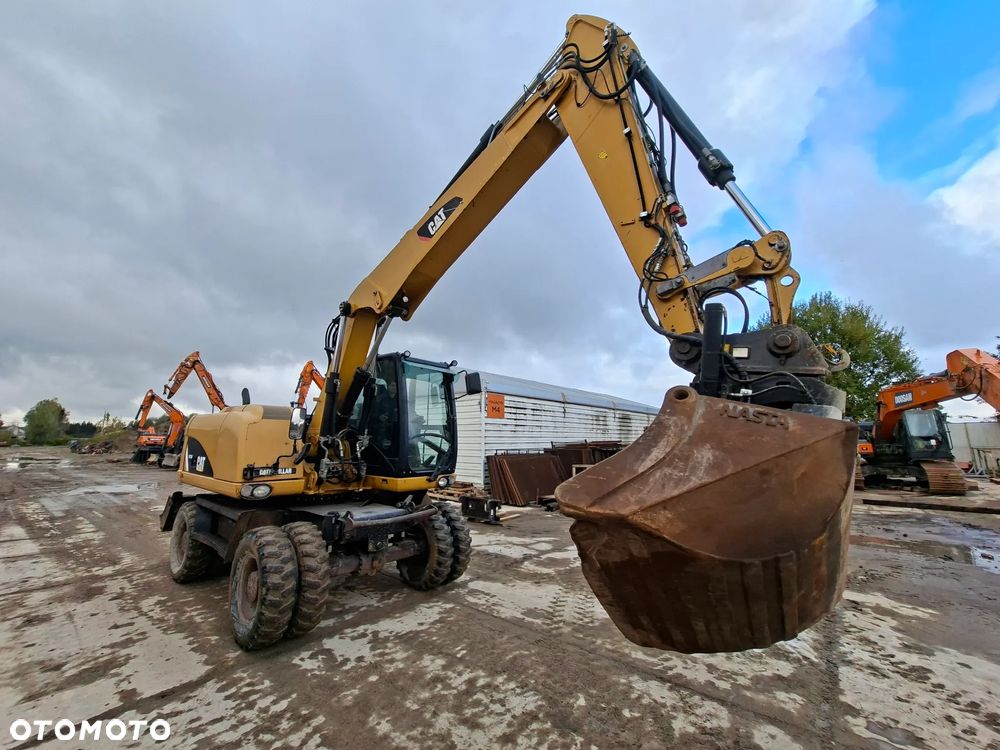 Caterpillar M313D - 5