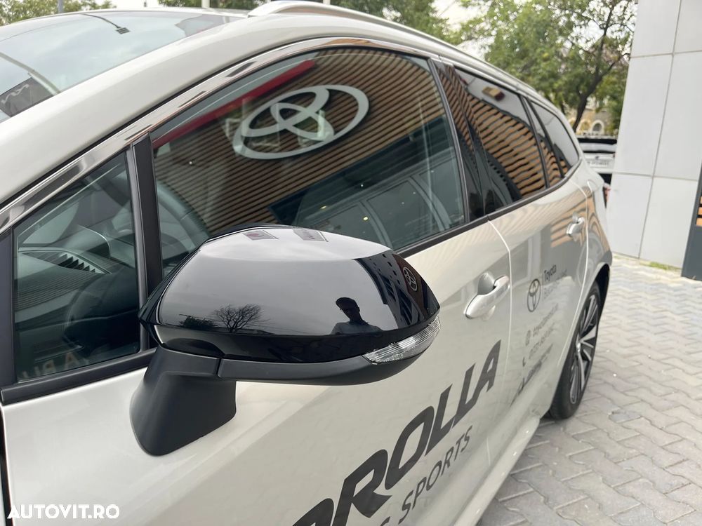 Toyota Corolla TS 1.8 HSD Dynamic - 11