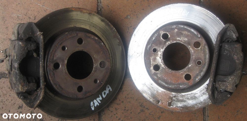 zacisk hamulcowy jarzmo lewy prawy FIAT PANDA II 1.2 8V - 1