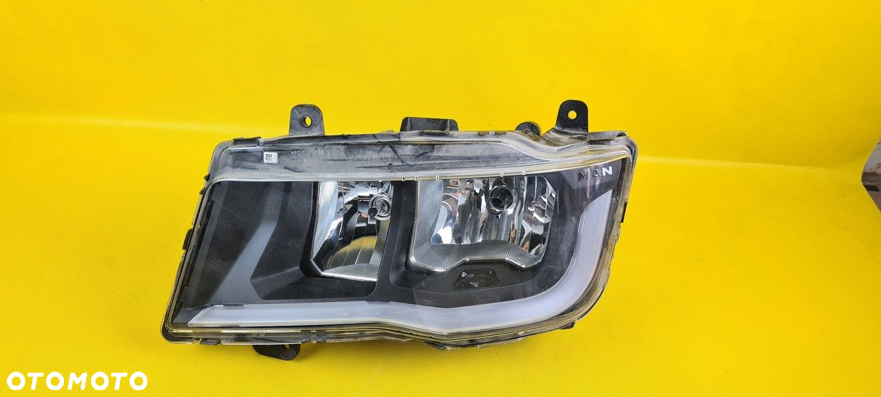 LAMPA REFLEKTOROWA H7 LEWA MAN LION 4 CITY 36.25101-6039 - 2
