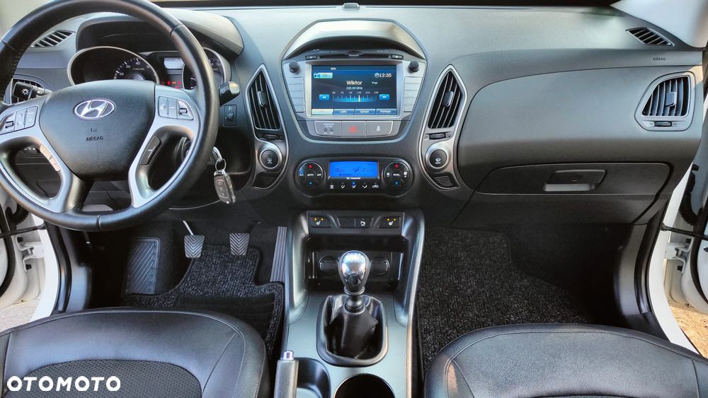 Hyundai ix35 blue 1.6 2WD Finale Gold - 11