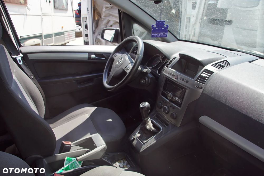 Auto na części - Opel Zafira B 1.8 16V 140 KM Z18XER F17 Z157 2006R Silnik Skrzynia Drzwi Maska Błotnik Zderzak Klapa Lampa Lusterko Klamka Szyba Deska Kokpit Sterownik Moduł Czujnik Licznik Wyświetlacz Panel Kierownica - 13