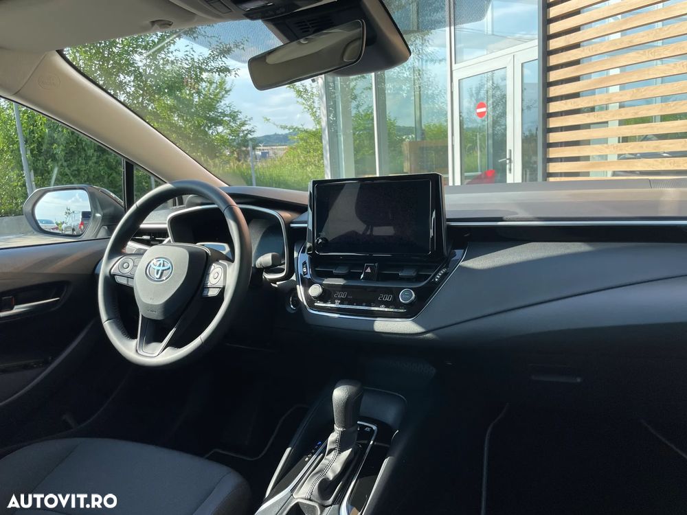 Toyota Corolla 1.8 HSD Eco - 11