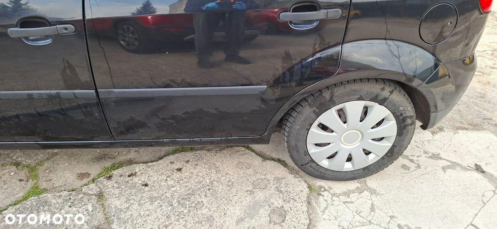 Ford Fiesta 1.4 Ghia - 4